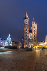 Naklejka premium Krakow, Poland, Christmas on Main Market Square and St Mary's church