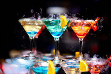 glasses of cocktails bar