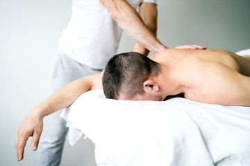 Fototapeta na wymiar young man getting a massage