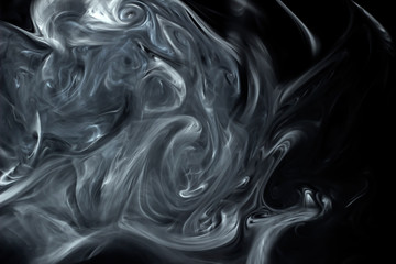 Texture of cigarette smoke on black background