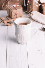 Cup of cocoa or chocolate on wooden Christmas background. Winter hot chocolate drink