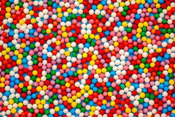 Fototapeta na wymiar colorful texture of sweet decorative balls, background.macro
