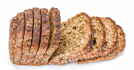 Dark rue bread with sunflower seeds on a white background