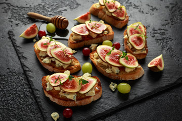 This Fig and Gorgonzola tartines, toast, bruschetta. drizzled with honey.