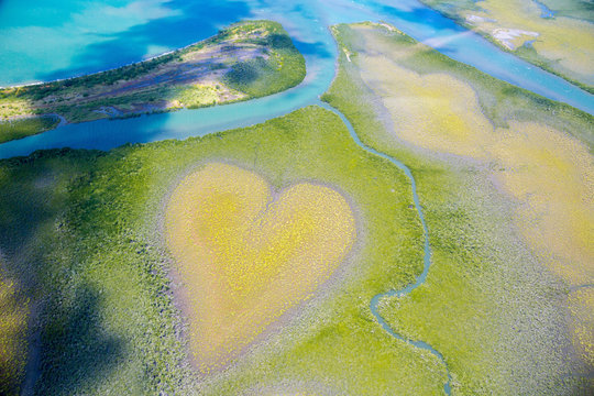 Heart of Voh, aerial view, formation of mangroves vegetation resembles a heart seen from above, New Caledonia, Micronesia, South Pacific Ocean. Heart of Earth. Earth day. Love life, save environment.
