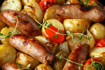 Homemade Pork sausages with potato, red pepper and onion