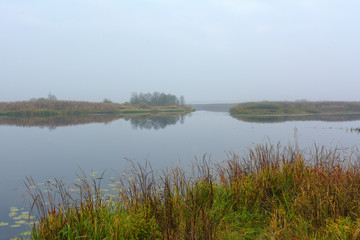 Landscape with lake and clouds