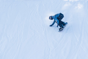 People are enjoying skiing	/ snowboarding	