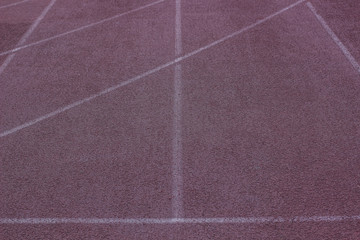 running dirty old track marking road background material texture in football stadium perspective...