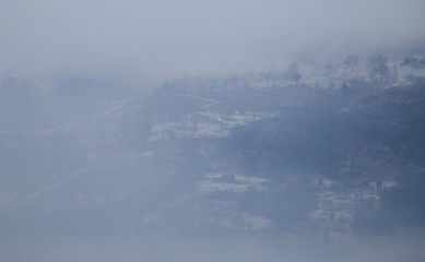 Foggy  village Bohdan in the Carpathians