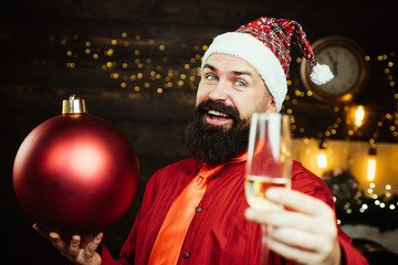 Christmas Santa claus with bomb. Christmas Celebration holiday. Christmas man in fashion red dress hold bomb. Bomb emotions. Party Christmas.