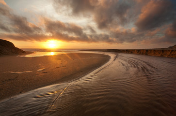 California Beach at Sunset, Creek flowing into Pacific Ocean