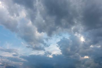 Fototapeta na wymiar Day blue shy with strong dark clouds
