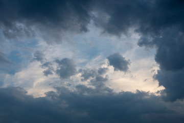 Fototapeta na wymiar Day blue shy with strong dark clouds