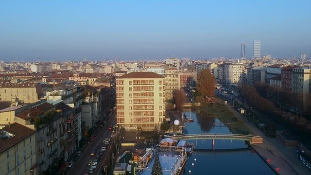 Milan aerial view over navigli - shot from drone at sunrise