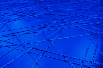 connecting lines rope intersecting network mesh close up web channels pipeline abstract