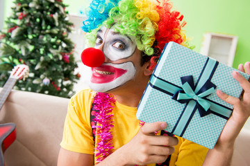 Funny clown in Christmas celebration concept 