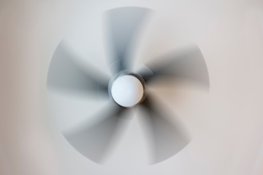 spinning gray ceiling fan