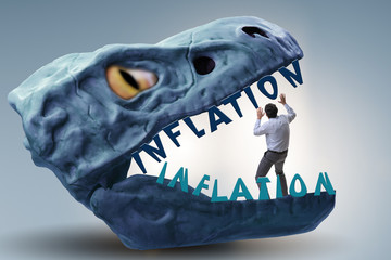 Businessman in inflation business concept