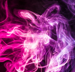 Colored smoke on black background
