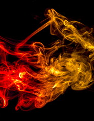 Colored smoke on black background