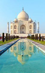 Front view of Taj Mahal reflected in the water, India