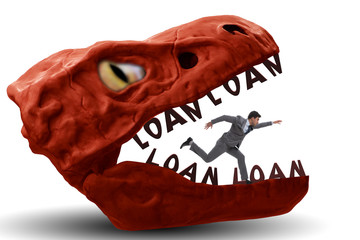 Businessman in the jaws of debt and loan