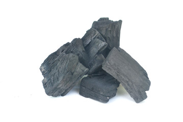Charcoal burns through high-temperature combustion,Black wood charcoal white background,Charcoal White Background.
