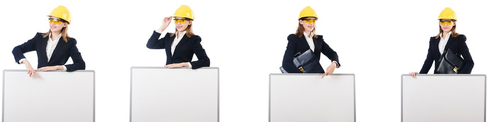 Young female builder with whiteboard 