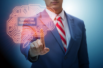 Businessman pressing virtual button in quantum computing concept
