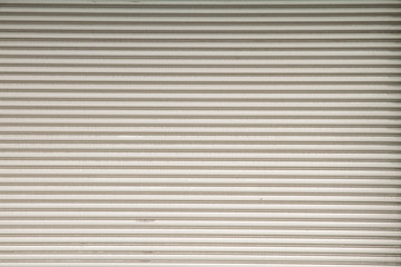 Steel door with beautiful horizontal stripes.