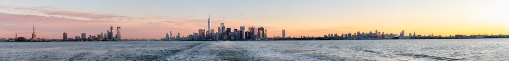 Fototapeta na wymiar Very Wide Panorama of Manhattan and New Jersey Skyline with The Statue of Liberty on the Side