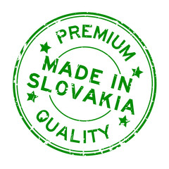 Grunge green premium quality made in Slovakia round rubber seal stamp on white background