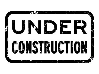 Grunge under construction square rubber seal stamp on white background