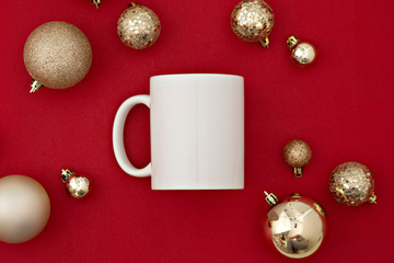 red background with gold balls and white mug