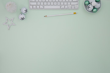 white keyboard in green background