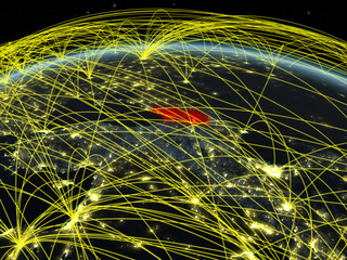 Georgia on planet Earth at night with international network representing communication, travel and connections.