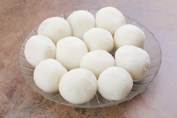 Indian Sweet Rasgulla Also Know as Rosogolla, Roshogolla, Rasagola, Ras Gulla, Anguri Rasgulla or Angoori Rasgulla is a Syrupy Dessert Popular in India. It is Made From Ball Shaped Dumplings