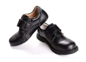 a new leather shoe and a damaged old one on white
