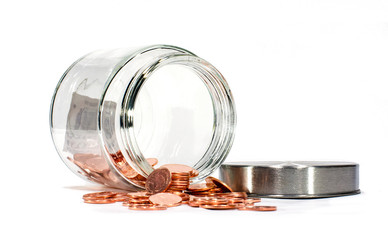 Golden coins from glass jar on white background : Concept for business and finance