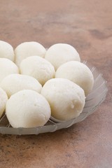 Indian Sweet Rasgulla Also Know as Rosogolla, Roshogolla, Rasagola, Ras Gulla, Anguri Rasgulla or Angoori Rasgulla is a Syrupy Dessert Popular in India. It is Made From Ball Shaped Dumplings