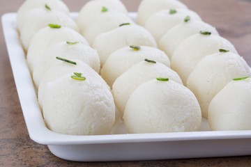 Indian Sweet Rasgulla Also Know as Rosogolla, Roshogolla, Rasagola, Ras Gulla, Anguri Rasgulla or Angoori Rasgulla is a Syrupy Dessert Popular in India. It is Made From Ball Shaped Dumplings