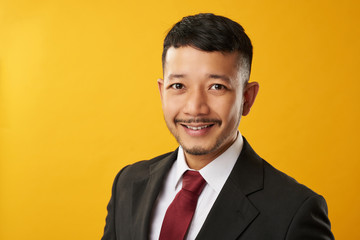 Happy asian guy headshot