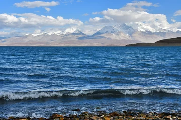 Fototapeten  Holy Rakshas Tal lake and Gurla Mandhata peak in Ngari, Western Tibet, China. This lake also known as Demons Lake, Ravana Tal or Ravan Harda, Langa Tso in Hindu Religion © irinabal18