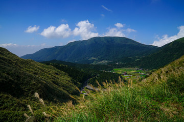 Green valley and blue sky