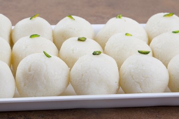 Indian Sweet Rasgulla Also Know as Rosogolla, Roshogolla, Rasagola, Ras Gulla, Anguri Rasgulla or Angoori Rasgulla is a Syrupy Dessert Popular in India. It is Made From Ball Shaped Dumplings