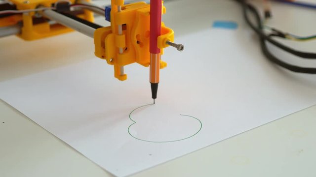 Plotter draws abstract calligraphic patterns