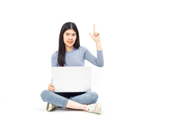 woman sitting floor holding laptop