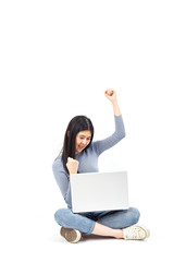 woman sitting floor holding laptop
