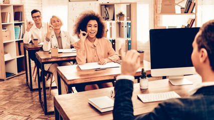 Pupils Studying Business and Finance in Classroom